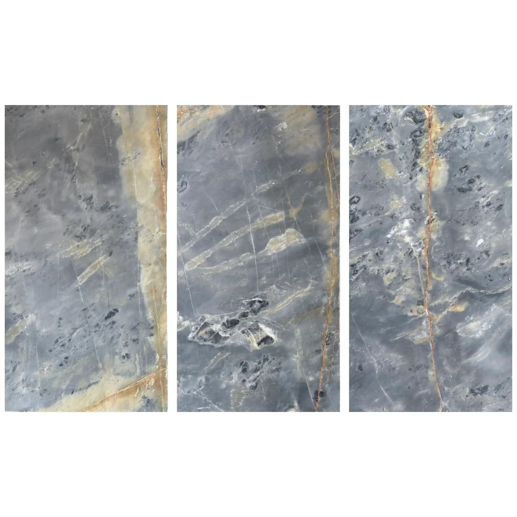 Three gray marble slabs of Sky Blue Azul Cielo 12X24 Marble Tile displayed elegantly