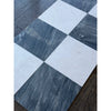 Black and white checkered marble floor tiles from Sky Blue Azul Cielo 18X18 collection