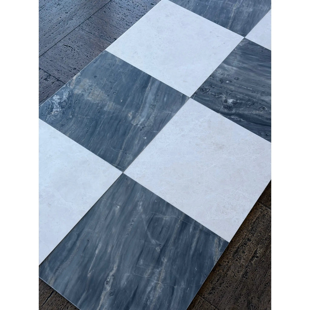Black and white checkered marble floor tiles from Sky Blue Azul Cielo 18X18 collection