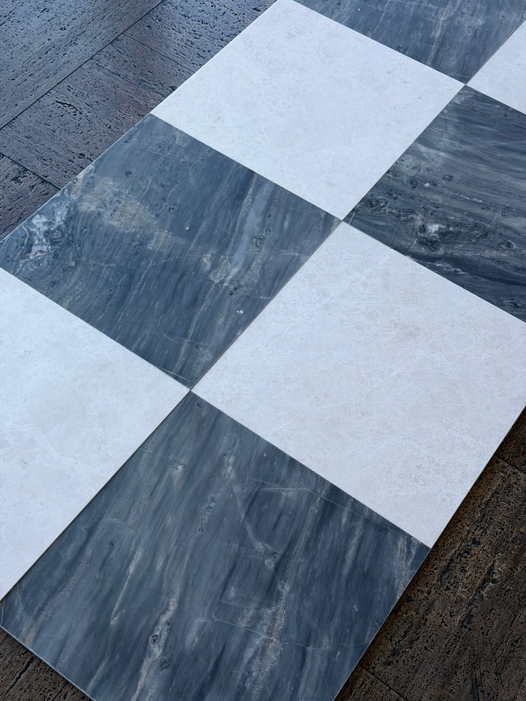 Black and white checkered marble floor tiles from Sky Blue Azul Cielo 18X18 collection
