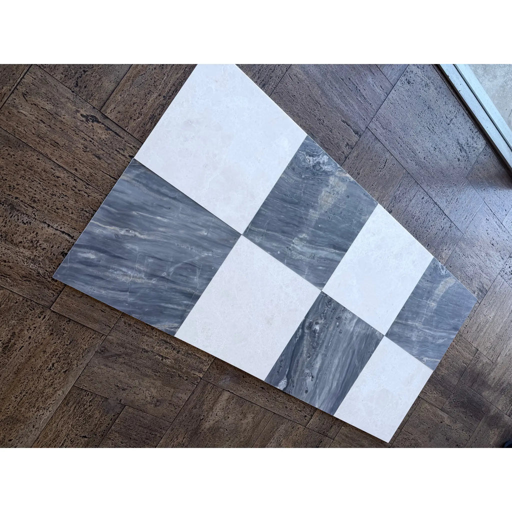 Gray and white checkered marble tile sample from Sky Blue Azul Cielo 18X18 collection