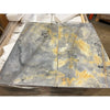 Gray and gold marble slabs in Sky Blue Azul Cielo 18X36 Marble Tile display
