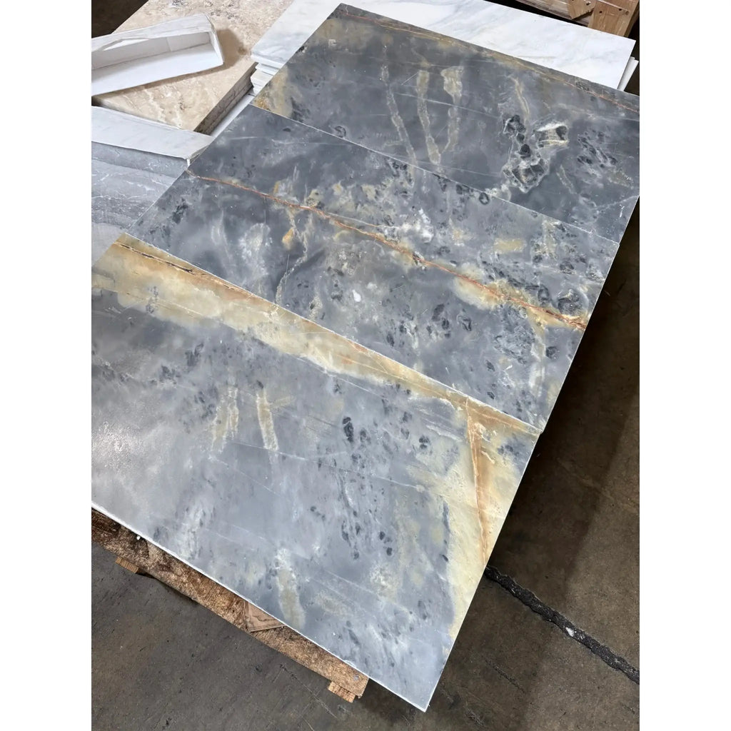 Gray and gold marble slabs of Sky Blue Azul Cielo 18X36 Marble Tile