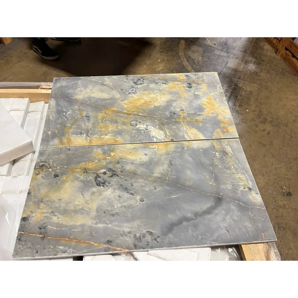 Gray and gold marble tiles in Sky Blue Azul Cielo 18X36 Marble Tile design