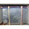 Gray and white marble slab with measurement markers for Sky Blue Azul Cielo tile