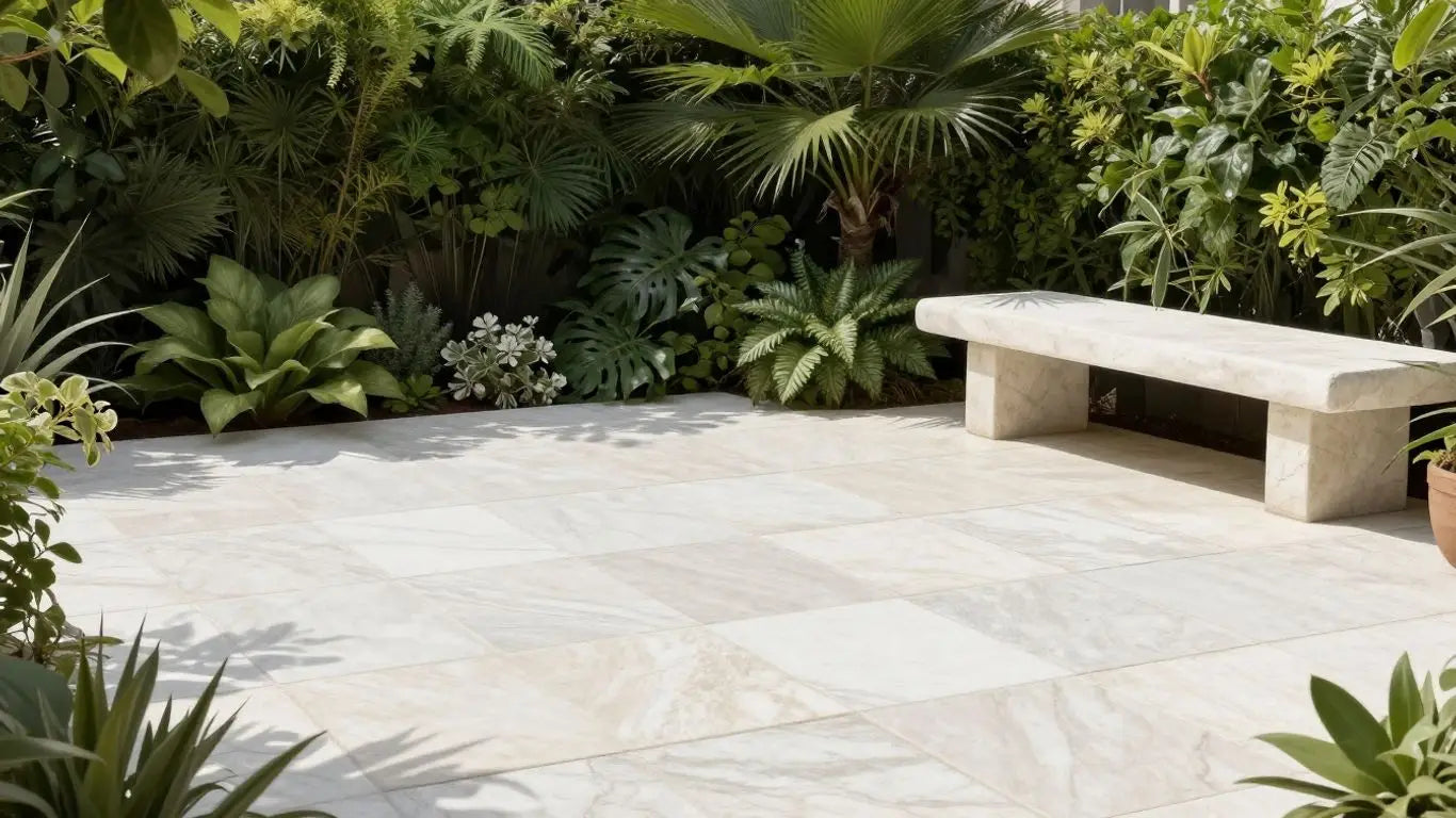 White limestone patio sketch with green plants.