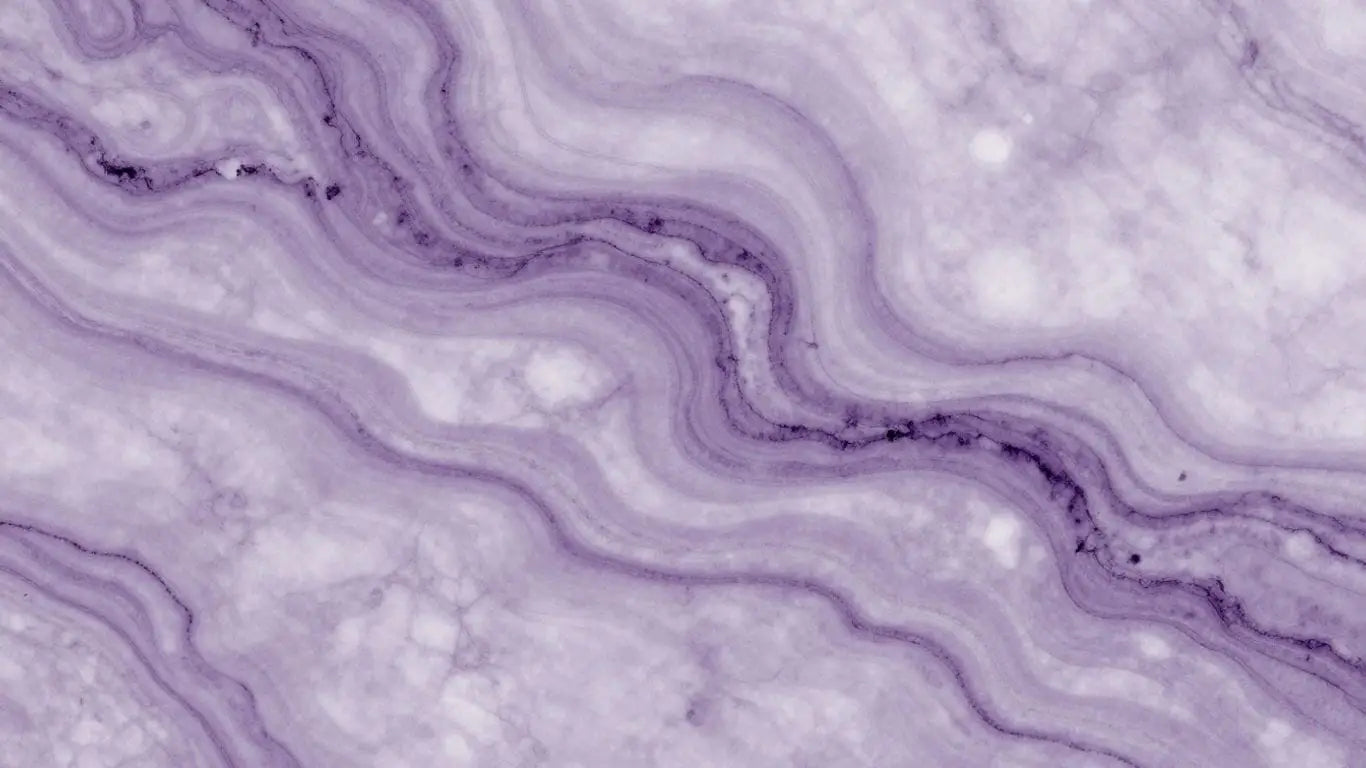 Polished lilac marble slab with purple veining.