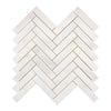 Snow White 1X4 Herringbone Marble Mosaic Polished in a white herringbone tile pattern