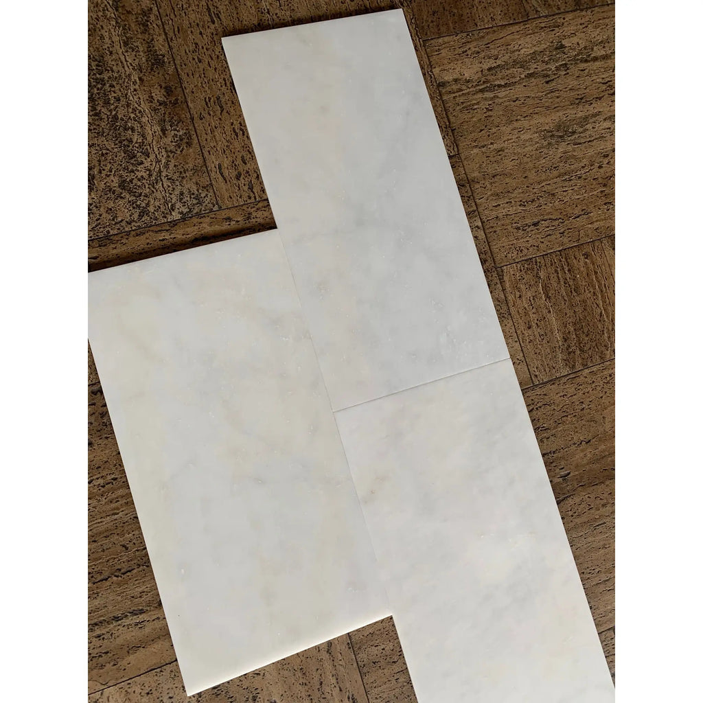 Snow White Marble 12x24 polished tiles with gray veining pattern