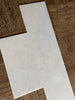 Snow White Marble 12x24 polished tiles with gray veining pattern