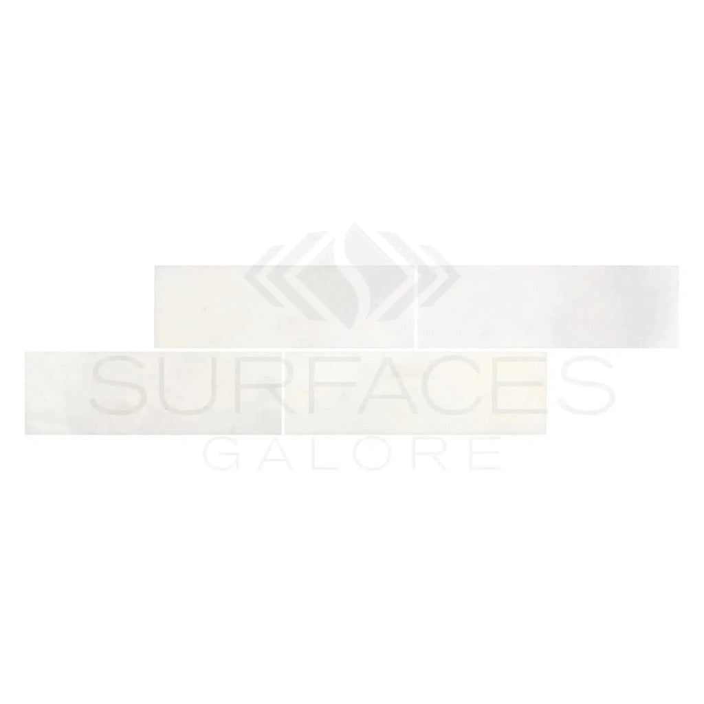 White rectangular tiles of Snow White Marble 4X12 Polished in an elegant display