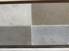 Solaris 16X24 reclaimed limestone tiles in multi finish blend, light and dark gray veined stone
