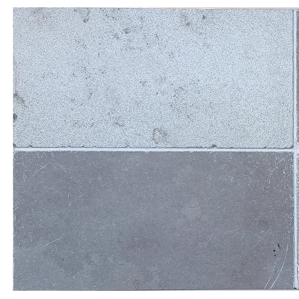 Two gray 16x24 reclaimed limestone tiles in Solaris Multi Finish Blend