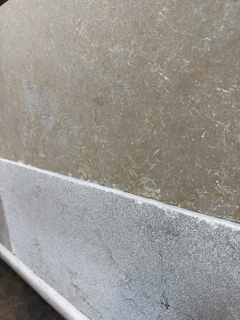 Solaris 16x24 reclaimed limestone tile with beige textured and speckled gray finishes