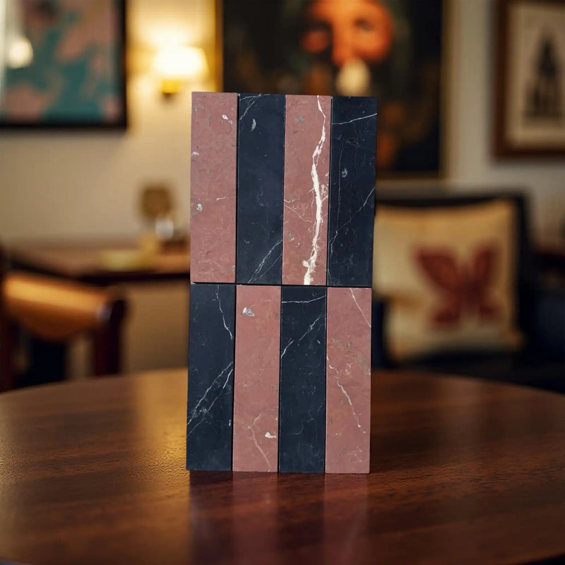 Stacked black and red marble blocks.