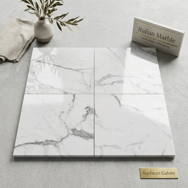 White Italian Statuario 12x12 premium marble tiles with elegant gray veining arranged in a four-square layout