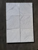 Six Statuario white marble 12x12 tiles with gray veining in grid