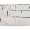 White marble-patterned tiles from Statuary Statuario White 12X24 Italian Marble collection
