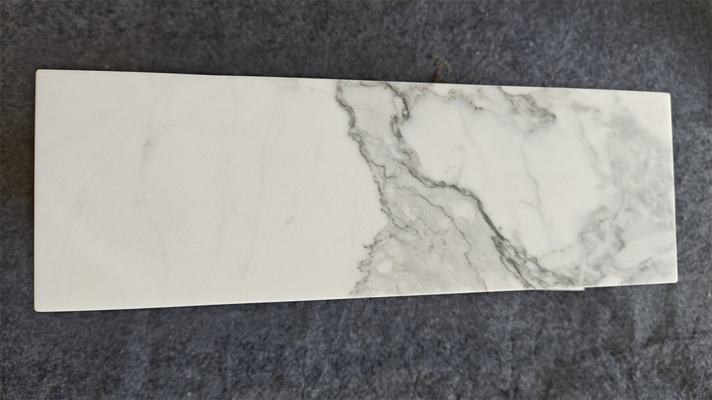 Statuario White 12x24 Italian marble tile with gray veining, polished