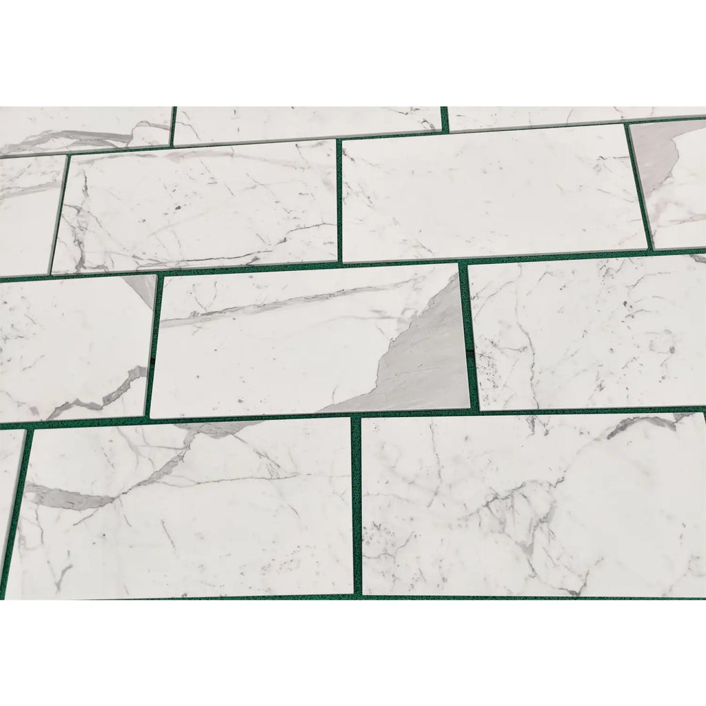 White marble-patterned rectangular tiles from Statuary Statuario White 12X24 Italian Marble collection