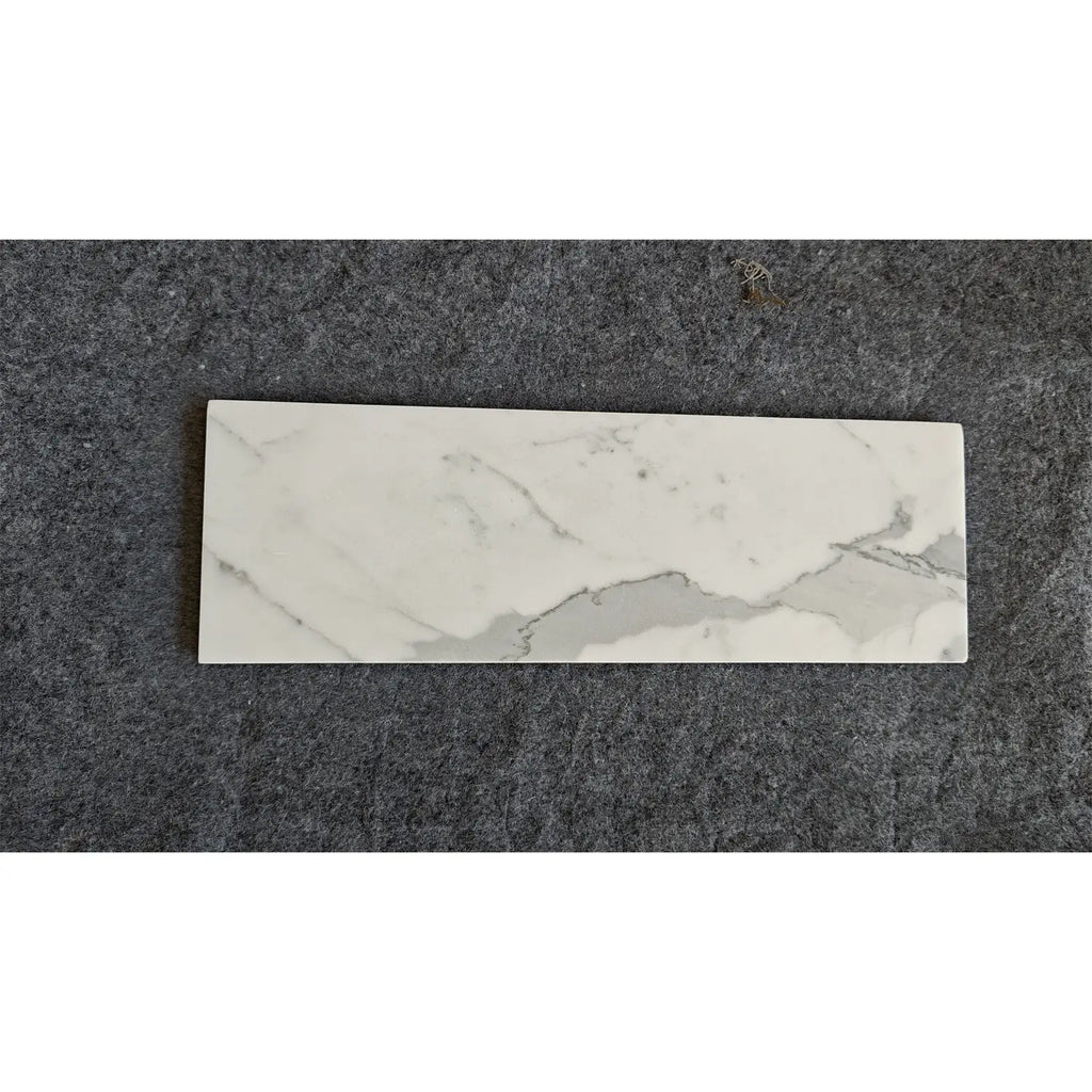 Statuario White 12x24 Italian marble tile with gray veining, polished