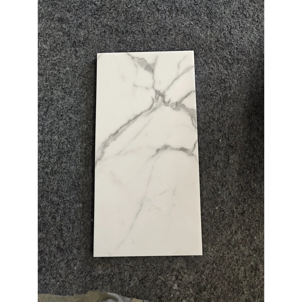 Statuario White 18x36 Italian marble tile with gray veining
