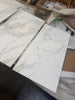 Statuario White 18x36 Italian marble tiles with gray veining