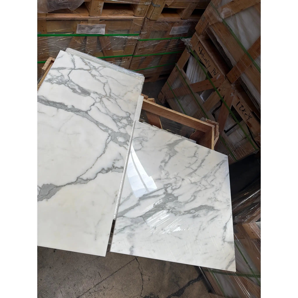 Statuario White 18x36 Italian marble tile with gray veining and glossy finish