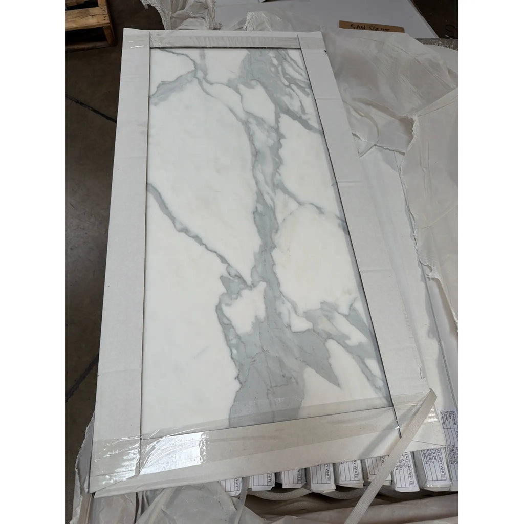 Statuario White 18x36 Italian marble tile with gray veining, polished finish
