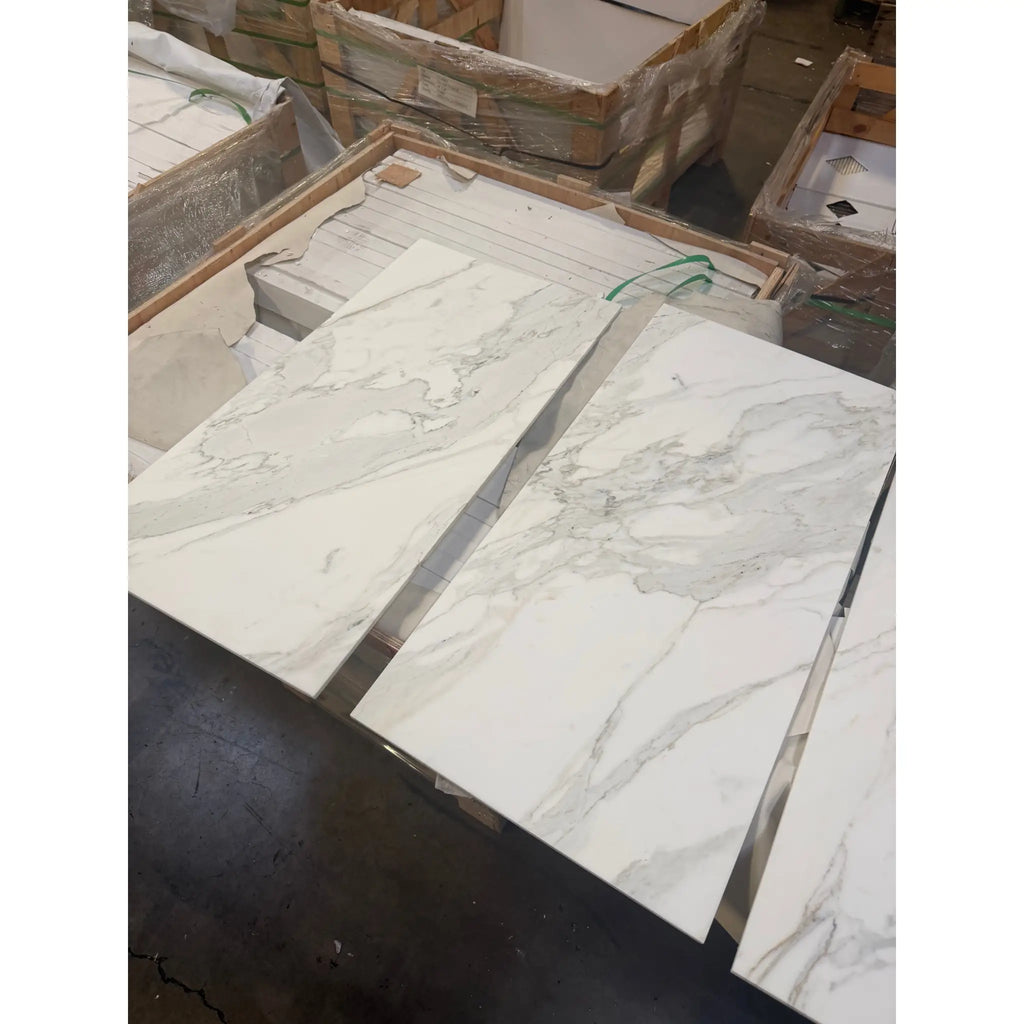 Statuario white 18x36 Italian marble slabs with gray veining in crates