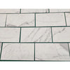 White marble-patterned tiles from Statuary Statuario White 24X24 Italian Marble collection