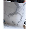 A sleek polished white marble slab with elegant gray veining in statuario white 24x24 premium italian marble