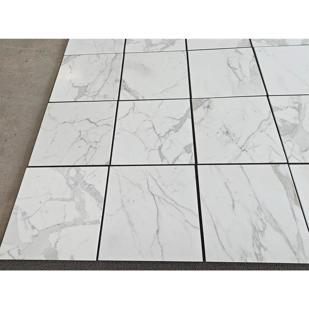 Statuario white 24x24 premium italian marble floor tiles with polished or honed finish and subtle gray veining