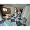 Black and white checkered floor featuring prestigiously polished statuario white 24x24 premium Italian marble tiles