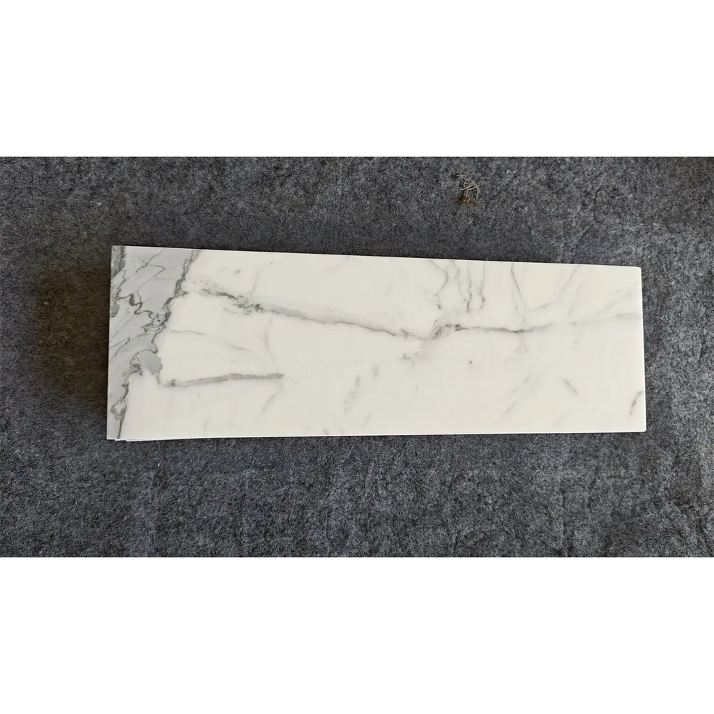 Statuario White 4x12 Italian marble tile with gray veining