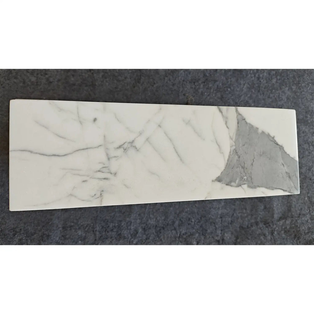 Statuario White 4x12 Italian marble tile with gray veining