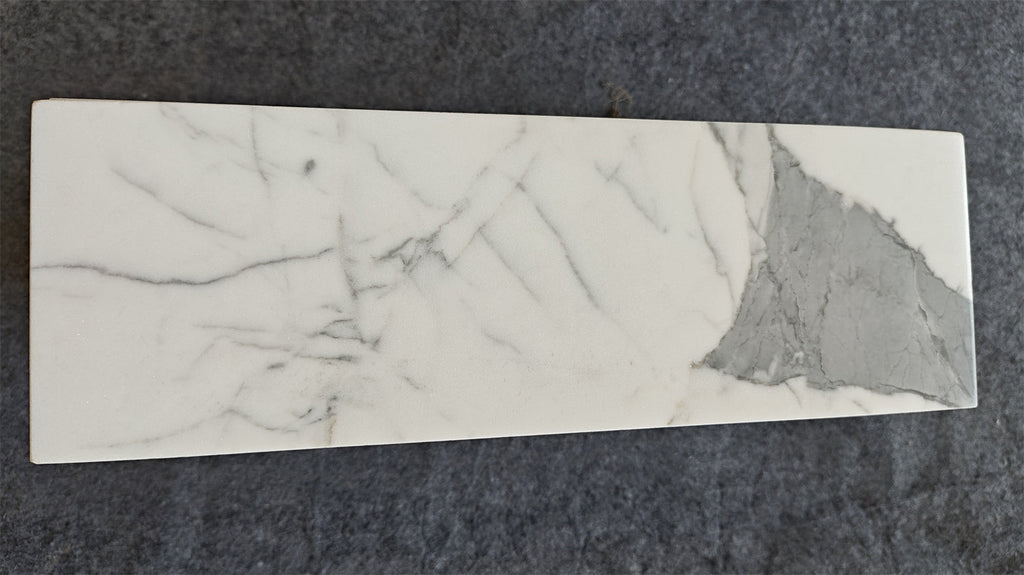 Statuario White 4x12 Italian marble tile with gray veining