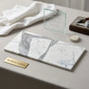 A sleek rectangular white marble tray with elegant gray veining in statuaria white 6x12 premium italian marble polished surface