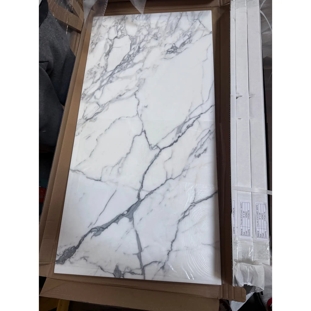 White marble-patterned tile from Statuary Statuario White 18x18 Italian marble collection