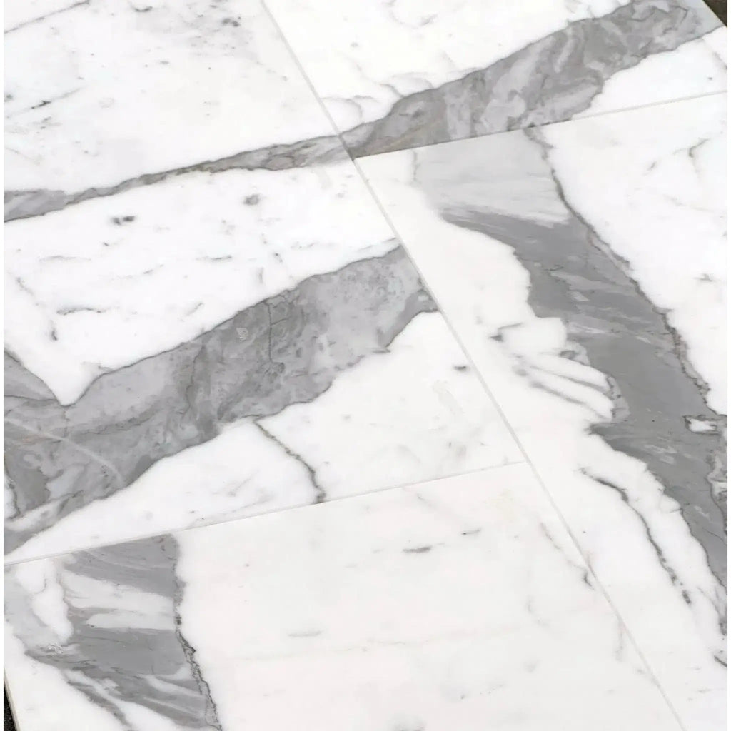 White marble floor tiles with gray veining in Statuary-Statuario White 3X6 Italian Marble