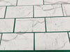 White marble-patterned tiles from Statuary-Statuario White 4x12 Italian marble collection