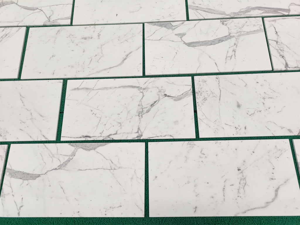 White marble-patterned tiles from Statuary-Statuario White 4x12 Italian marble collection