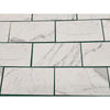 White marble-patterned tiles from Statuary Statuario White 4X12 Italian Marble collection