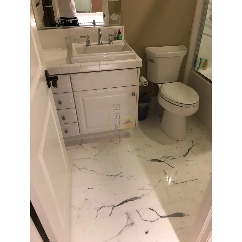 White bathroom featuring Statuary-Statuario White 4X12 Italian Marble floor