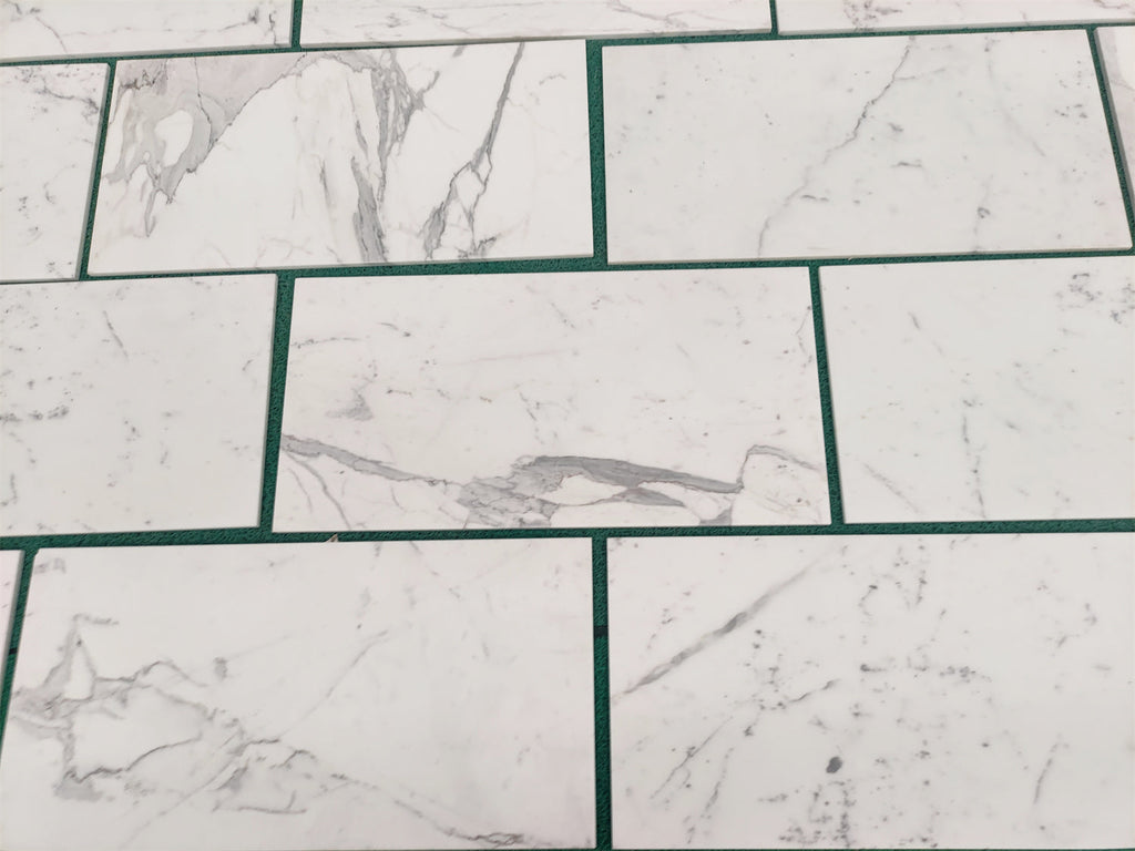 White marble-patterned tiles from Statuary-Statuario White 4X12 Italian Marble collection