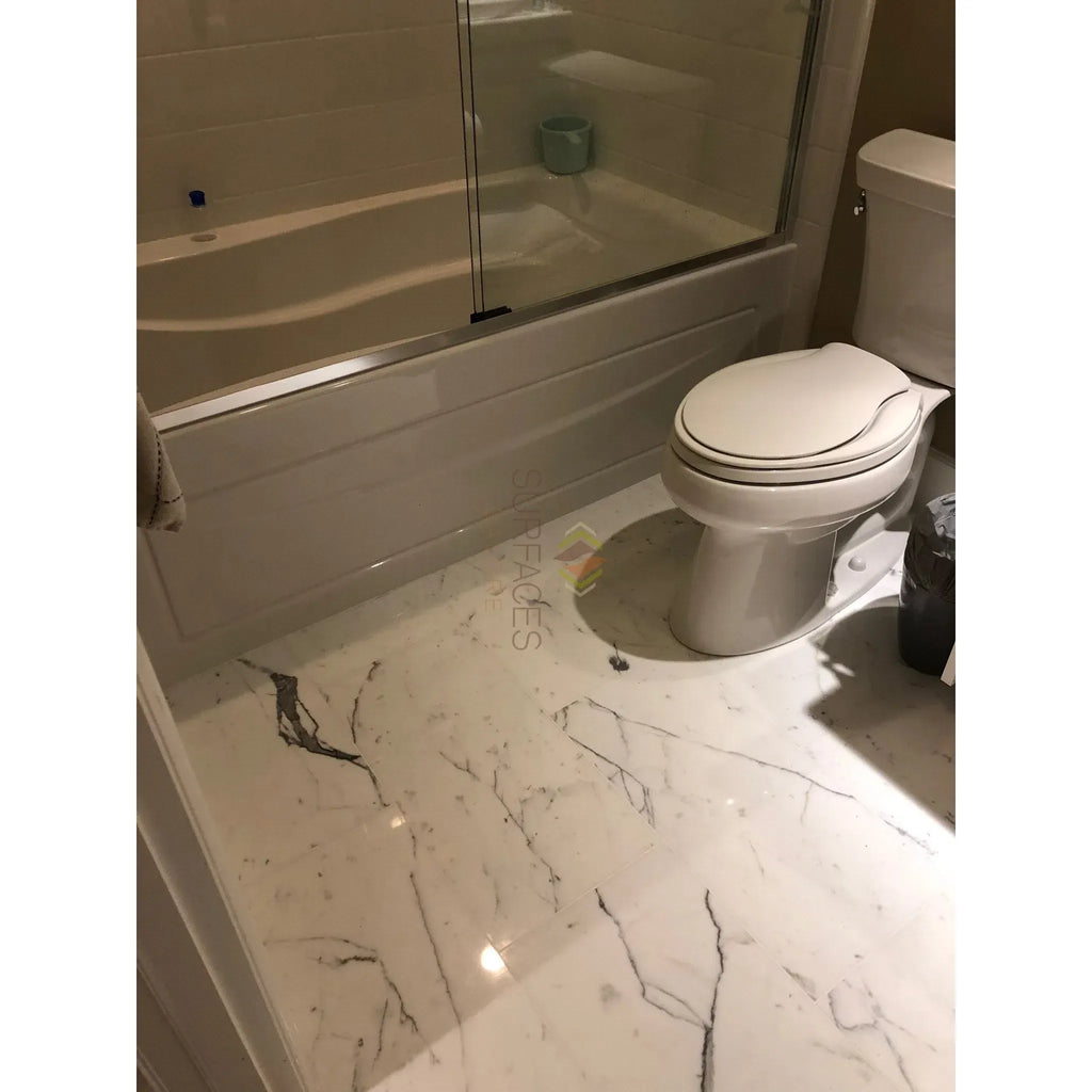 White dual flush toilet displayed with Statuary-Statuario White Italian marble