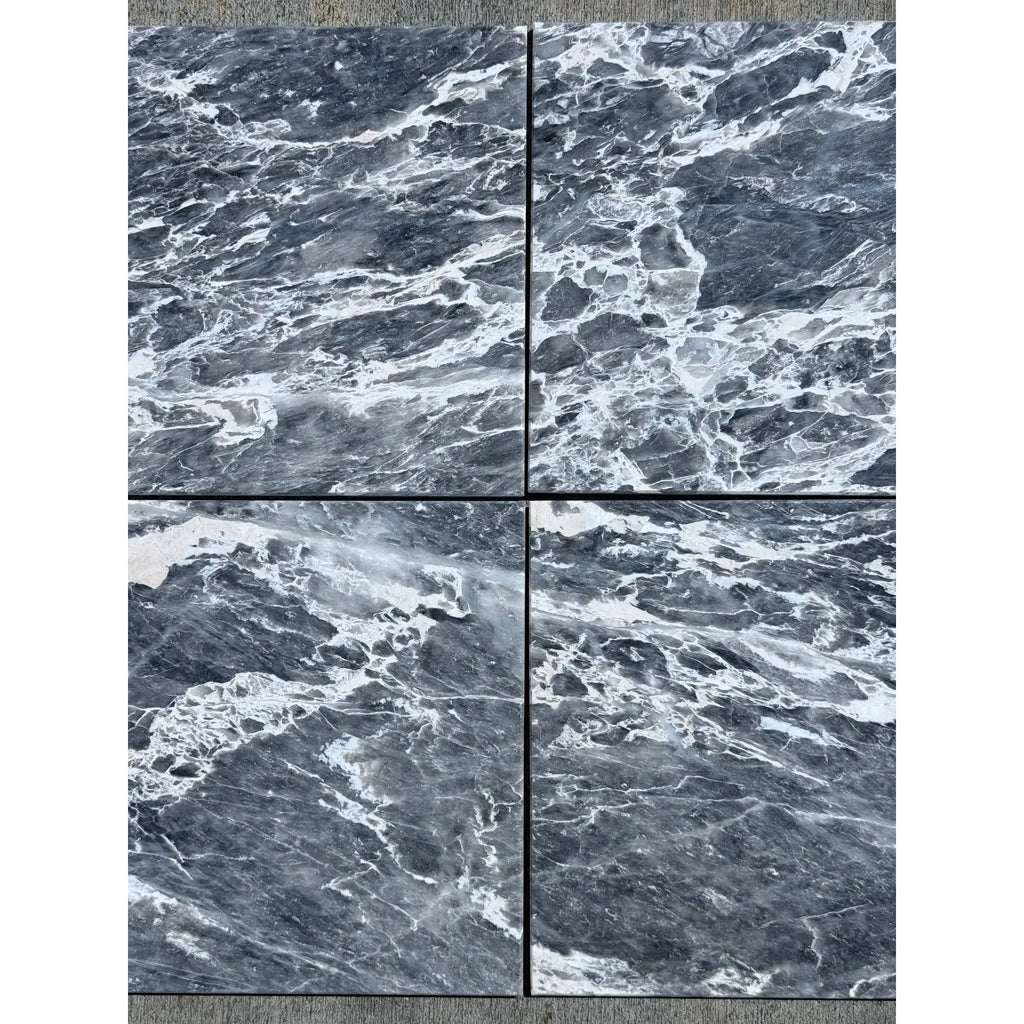 Polished Storm Gray Marble 12X12 tiles with dark grey background and prominent white veining