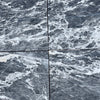 Four dark gray Storm Gray Marble 12x12 polished tiles with white veining