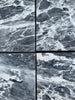 Four dark gray marble tiles with striking white veining for Storm Gray Marble 12X12 Polished