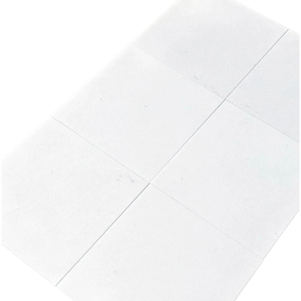 Thassos White Marble 12X12 Honed Tile showcasing elegant white square tiles